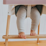 Child in IKEA Antilop Highchair with Highchair Footrest in Bamboo