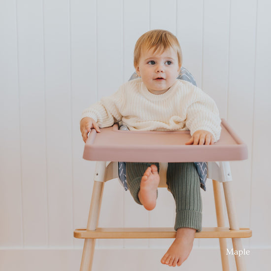 IKEA Highchair Footrest in Maple Timber with Pale Mauve Placemat