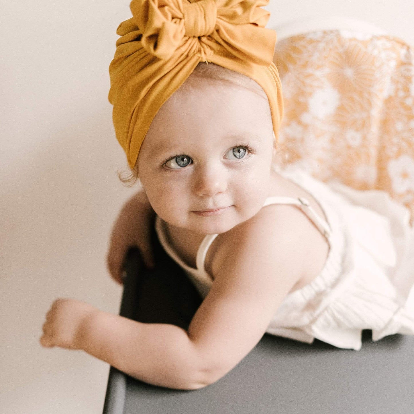 IKEA Highchair Cushion Cover in Papercut Floral in Mustard with Baby